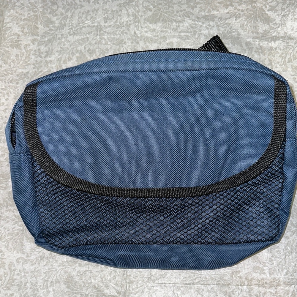 Belt Bag new without tags several  zipper compartments